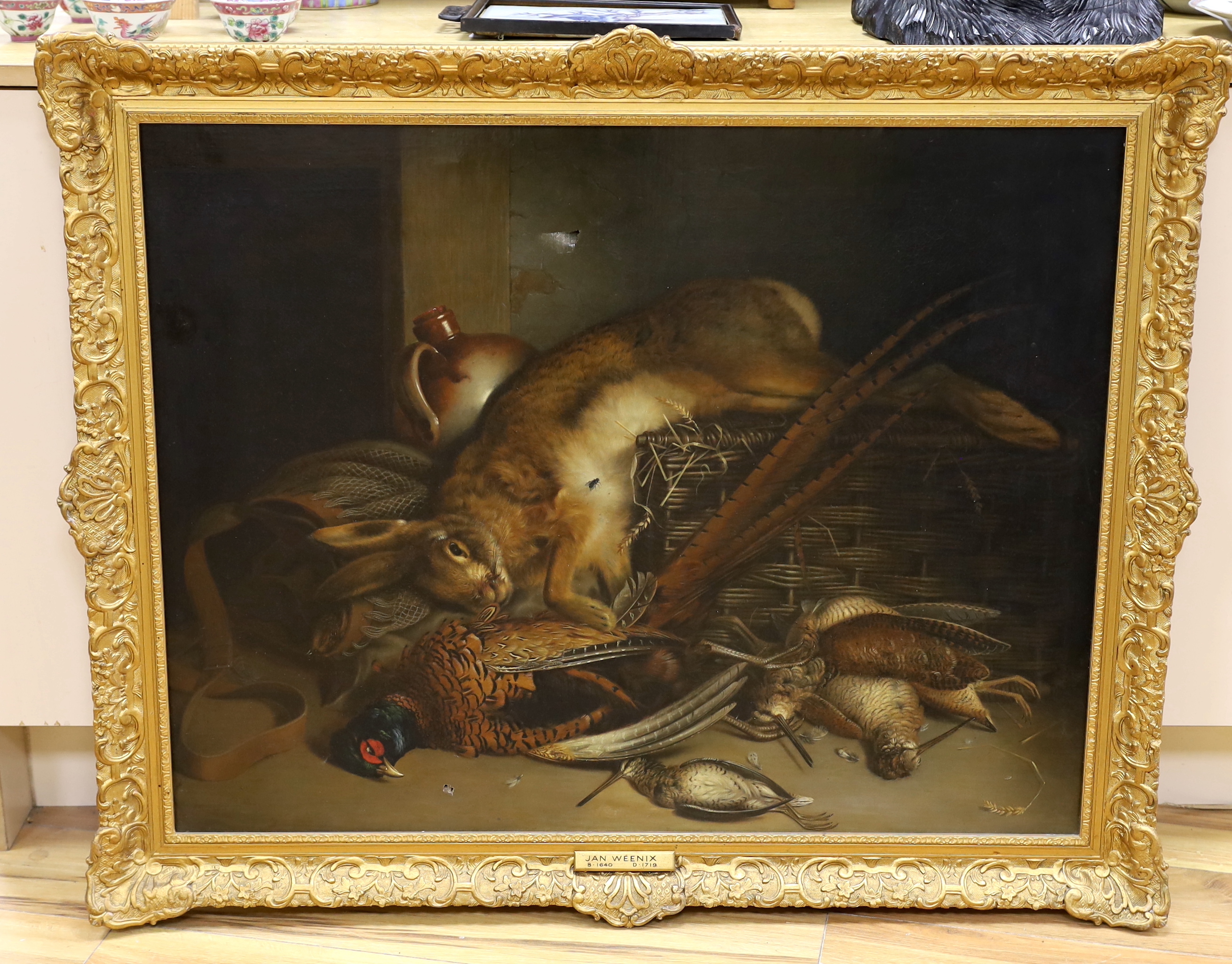 Follower of Jan Weenix (Dutch, 1642-1719), oil on canvas, Still life of dead game, applied plaque to the frame, 69 x 89cm